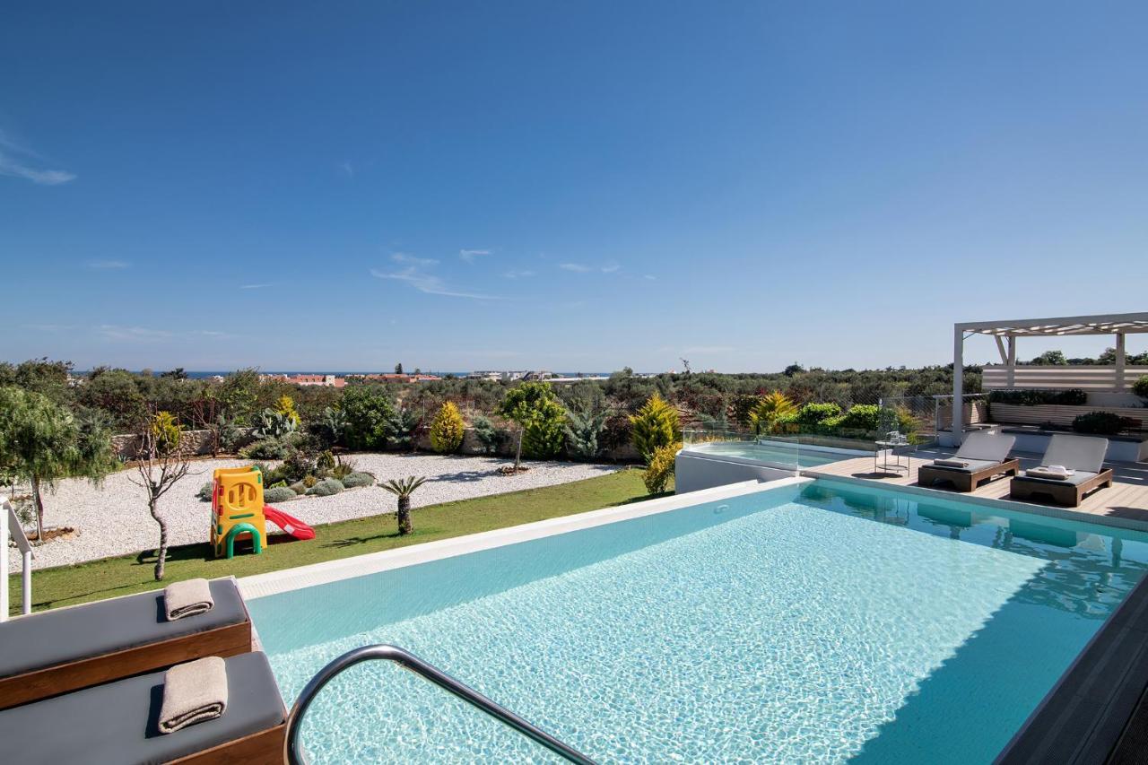 Alba Bianca Villa, Family Retreat With Heated Pool By Thinkvilla แอร์ซอนิสซอส ภายนอก รูปภาพ